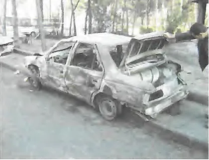 Photo: Aftermath of an aeroplane crash in Iran (2005). A CNG vehicle nearby remained intact; the cylinder's safety device functioned properly, preventing any explosion or rupture.